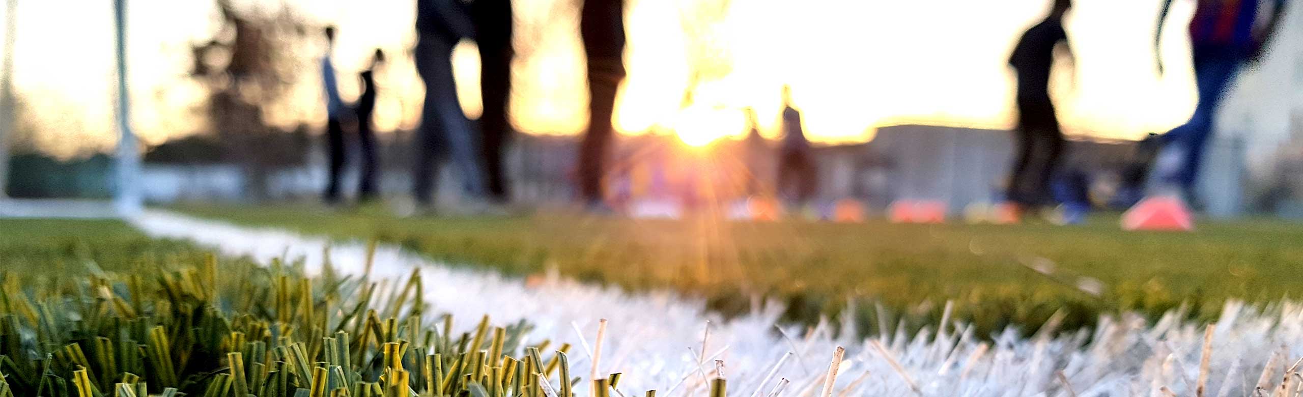 Synthetic turf pitch with integrated elastic layer of REGUPOL, installed on site with mineral components for optimum shock absorption 