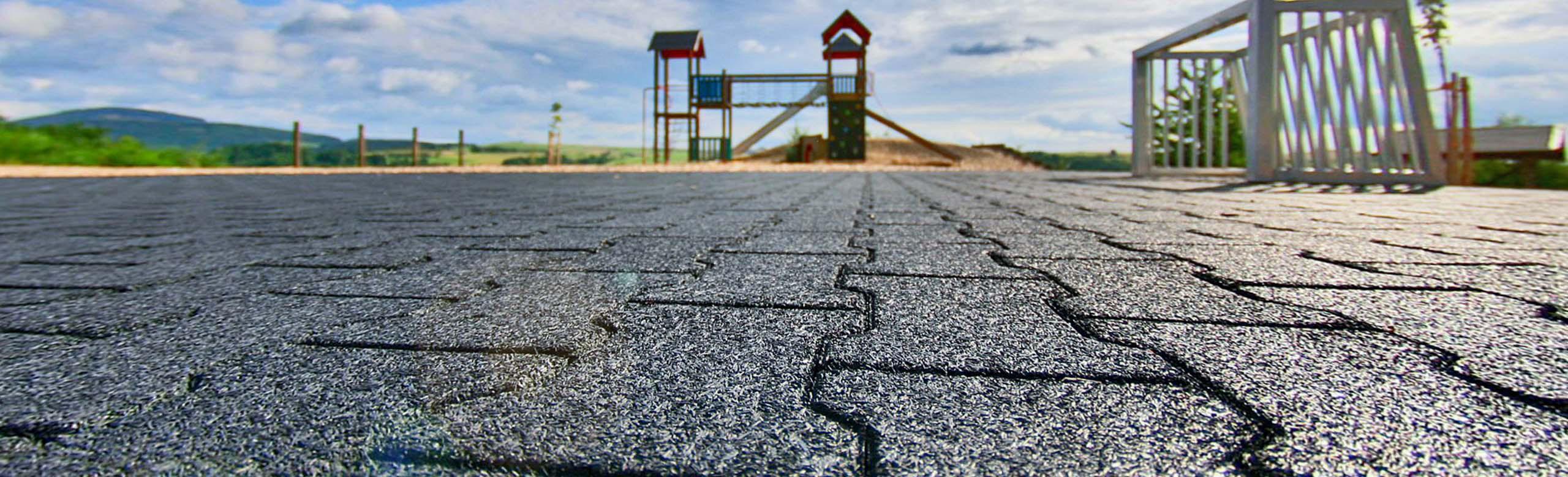 Small playing field with goal, laid with robust, non-slip REGUPOL playfix VB interlocking pavers in black